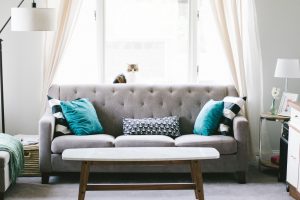 Living room decor grey sofa blue cushions